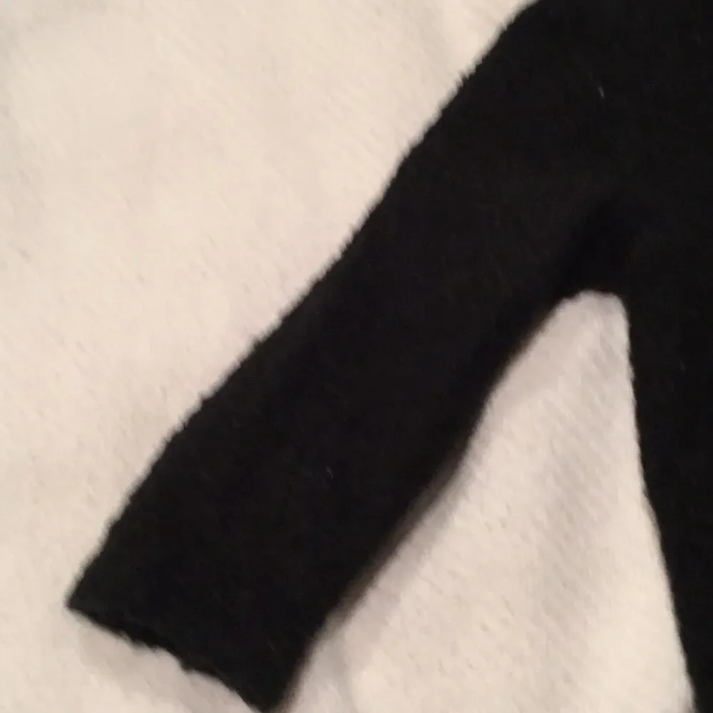 Black bejeweled one button black sweater worn once